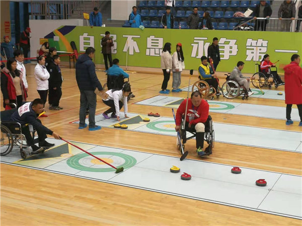 我区残疾人代表广东队参加全国第十届残运会旱地冰壶比赛荣获亚军